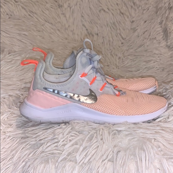 peach and white nike shoes